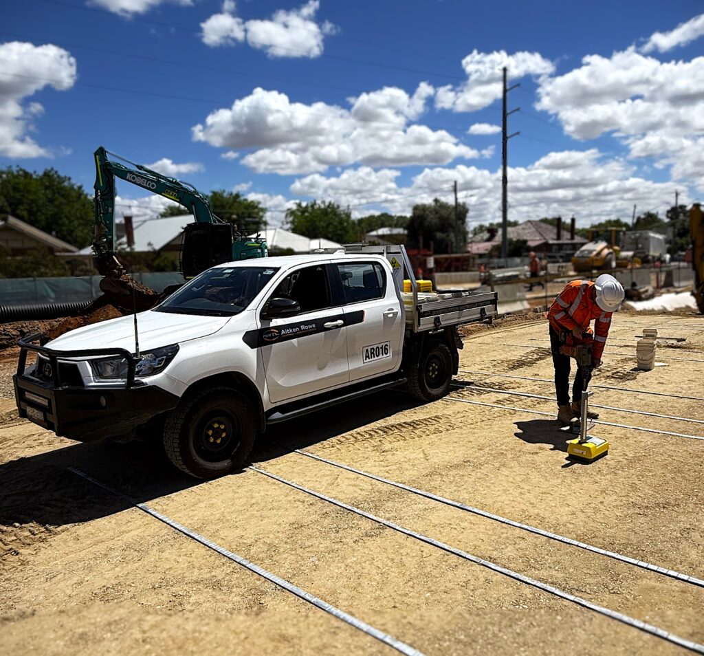 Geotechnician performing field nuclear density testing